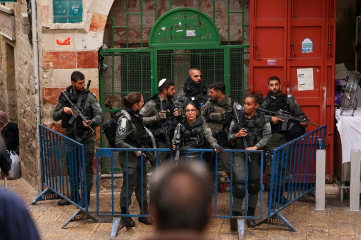 Israeli security personnel deploy in force across the walled Old City of annexed east Jerusalem