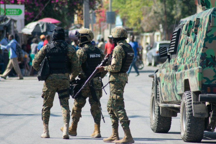 Haitian police officers deploy in Port-au-Prince, Haiti as sporadic clashes broke out in the capital