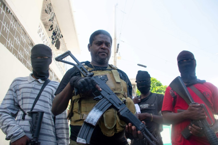 Armed gang leader Jimmy "Barbecue" Cherizier and his men are one of the main gangs in Port-au-Prince, Haiti