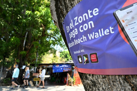 A sign promoting bitcoin transactions is seen in the beach town of El Zonte in El Salvador