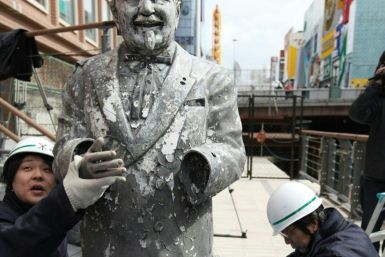 A statue of Colonel Sanders after it was recovered from the sludge of a river in Osaka, Japan on March 11, 2009
