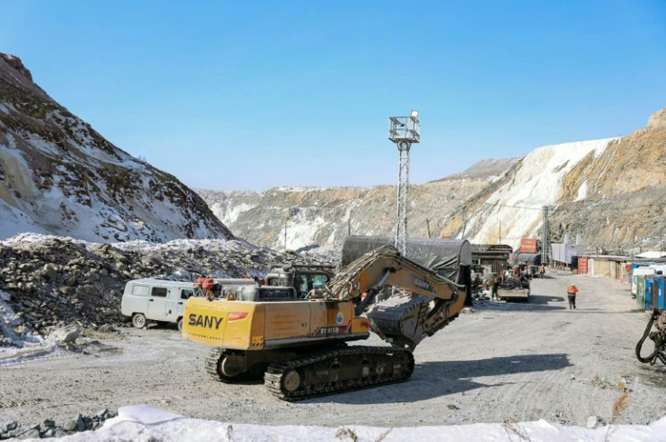Rescuers are scrambling to save over a dozen workers trapped under a Russian gold mine