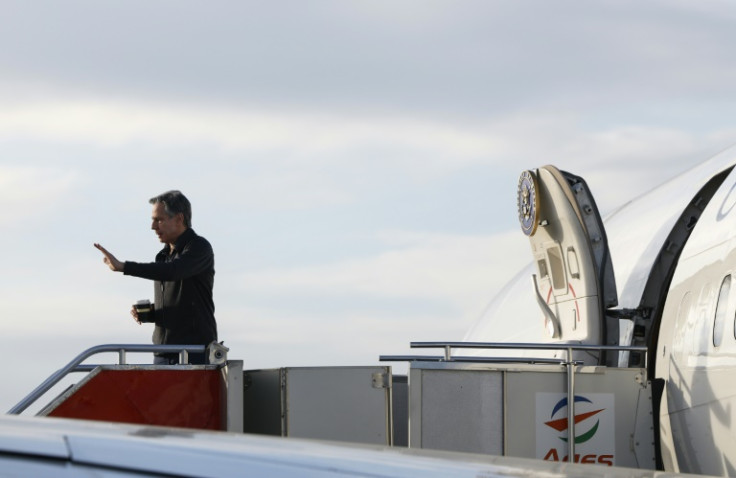 US Secretary of State Antony Blinken waves as he departs Philippines en route to Saudi Arabia