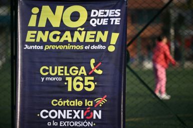 A poster in a crime-hit neighborhood of Bogota, urging people to report extortion attempts