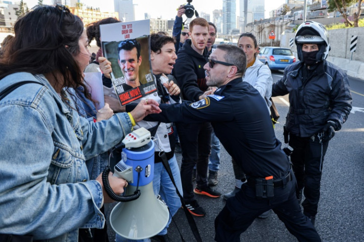 Israelis who have lobbied for action to get the remaining hostages freed block a main road in Tel Aviv