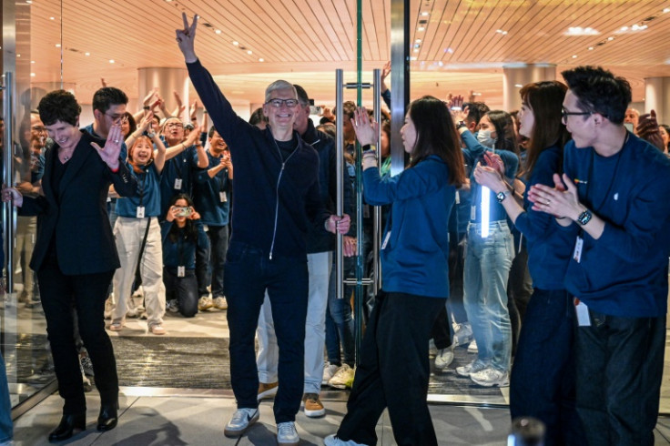 Apple CEO Tim Cook attended the opening of his company's newest store in Shanghai, amid growing worries over the iPhone maker's market share in China