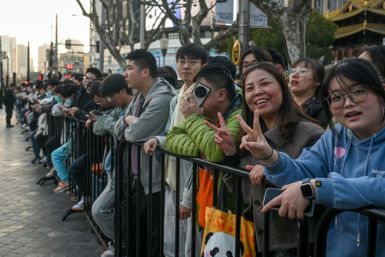 Customers lined up sometimes for days outside of Shanghai's new Apple retail store before its grand opening