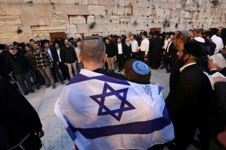 Israelis attend a mass prayer calling for the release of hostages held in Gaza