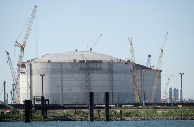 Cranes are seen near the construction site of the Venture Global LNG plant next to the Mississippi River in Plaquemines Parish south of New Orleans, Louisiana