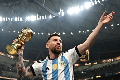 Adidas icon: Lionel Messi celebrates after leading Argentina to victory over Nike's France  in the 2022 World Cup final