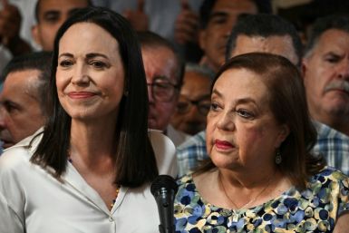 Opposition leader Maria Corina Machado (L) presents her replacement for July elections, Corina Yoris, at a news conference in Caracas, on March 22, 2024