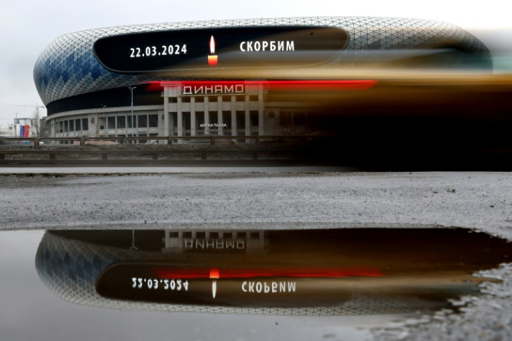 Tributes to the dead in the Moscow concert hall attack where paid across the country with signs saying: "22/03/24 - We Mourn"