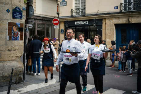 Competitors wound through the medieval streets of the Marais district