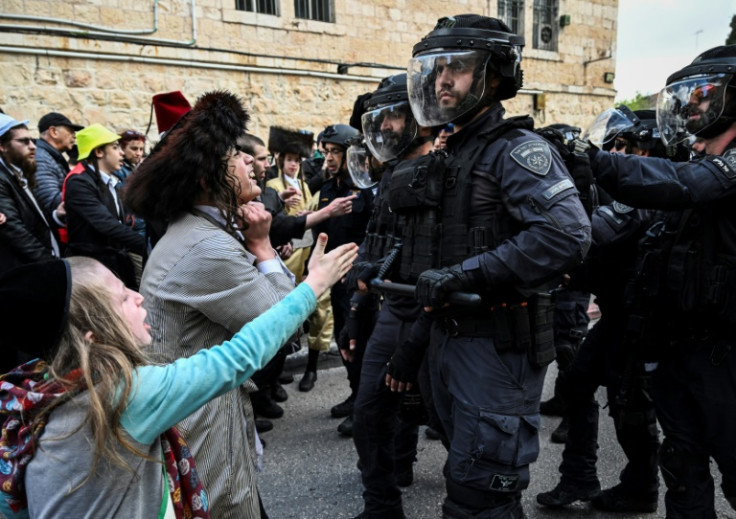 Ultra-Orthodox Jewish youths clash with Israeli security forces during the Purim celebrations in Jerusalem