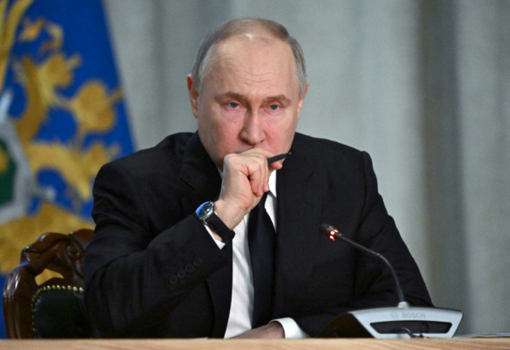 Vladimir Putin has said 'radical Islamists' were behind last week's attack but sought to tie it to Kyiv
