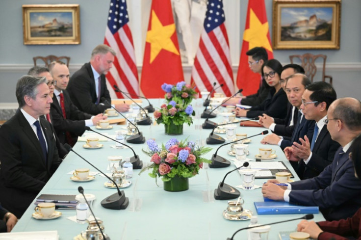 Vietnamese Foreign Minister Bui Thanh Son (third on right) speaks during a meeting with US Secretary of State Antony Blinken on March 25, 2024