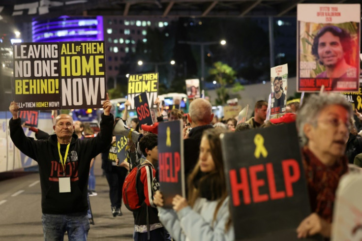 Relatives and supporters of Israeli hostages held in Gaza demonstrate in Tel Aviv on Tuesday