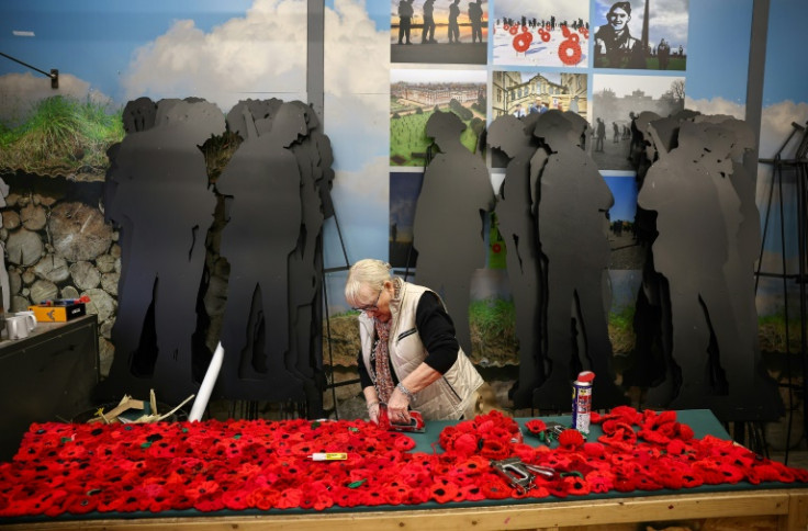 22,000 poppies - the symbol of remembrance - will also be attached to the silhouettes