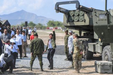 Philippine President Ferdinand Marcos inspecting a high mobility artillery rocket system on April 26, 2023