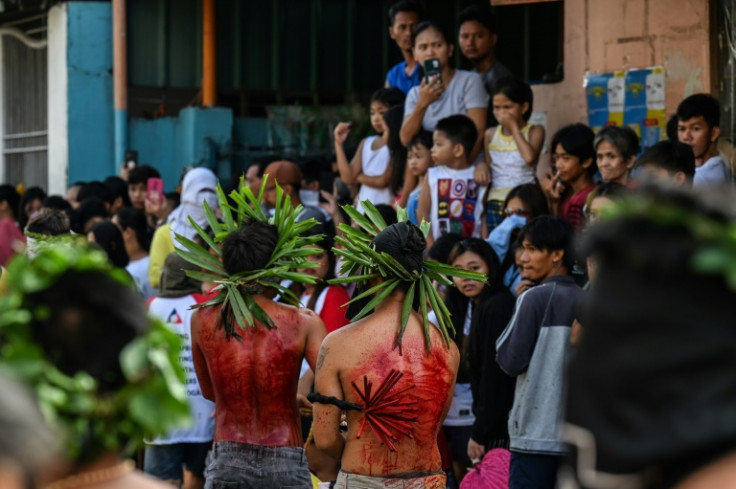 Hundreds gathered in villages around San Fernando city, north of Manila, to watch men punish themselves in a bid to atone for their sins or seek miracles from God