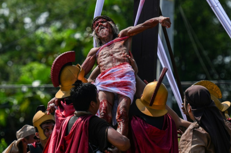 Wilfredo Salvador takes part in the re-enactment of the crucifixion of Jesus Christ on Good Friday in San Fernando on March 29, 2024