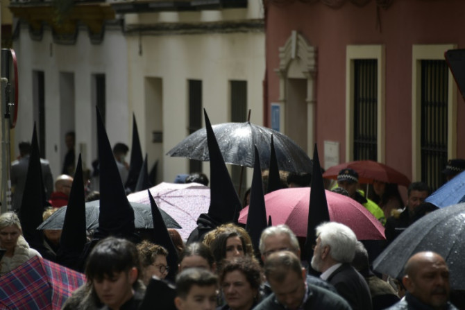 Easter Friday parades in Seville, which attract Christians from around the world, were called off because of torrential rain