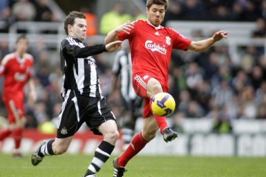 Xabi Alonso (R) won the Champions League as a player with Liverpool