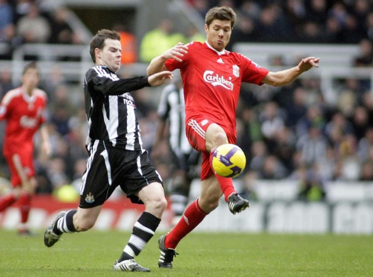 Xabi Alonso (R) won the Champions League as a player with Liverpool