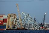 Cranes work to clear debris from the Francis Scott Key Bridge on March 29, 2024 in Baltimore, Maryland