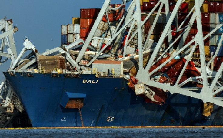 Wreckage from the Francis Scott Key Bridge rests on the Dali cargo ship