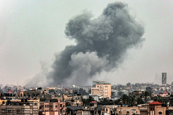 A smoke plume is seen during Israeli bombardment on Khan Yunis in the southern Gaza Strip on March 29, 2024, amid ongoing battles between Israel and the Palestinian militant group Hamas