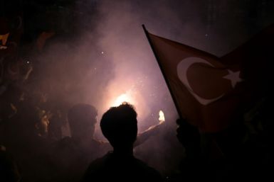 Opposition supporters in Istanbul celebrated with flags and flares overnight