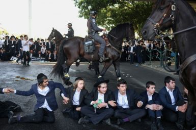 Ultra-Orthodox Israelis have been protesting efforts to remove their long-standing exemption from military service