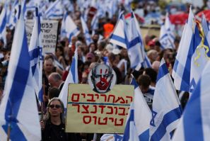 Thousands of Israelis have taken to the streets  to demand Prime Minister Benjamin Netanyahu quit