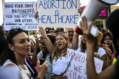 Abortion rights activists rally after the US Supreme Court struck down the right to abortion, in Miami, Florida, on June 24, 2022