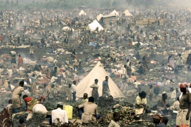 Tens of thousands of  Rwandan refugees pack into a makeshift camp just north Goma on July 17, 1994