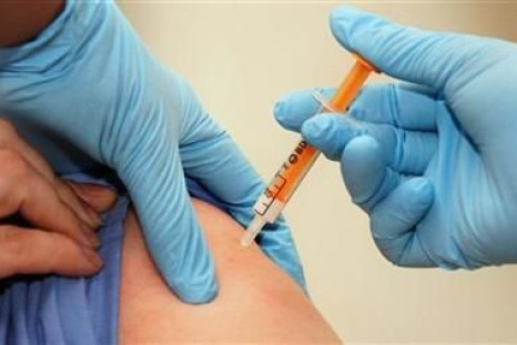 A patient is given a H1N1 swine flu vaccination at the University College London hospital