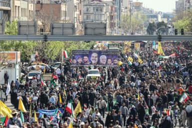Thousands of Iranians attend the funeral of the seven IRGC members