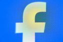A photo taken on April 3, 2024 shows the logo of US online social media and social networking service Facebook on a smartphone screen
