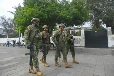 Soldiers patrol outside the Mexican embassy in Ecuador amid rising diplomatic tensions between the two countries