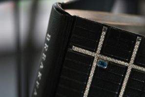 The one of a kind volume is signed by the author and decorated with almost 30 carats of diamonds