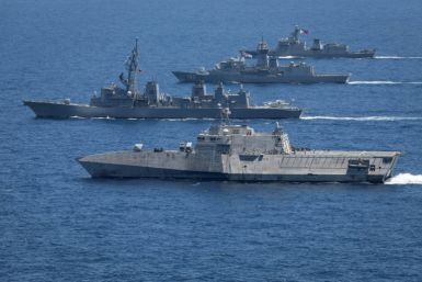 The USS Mobile, JS Akebono, HMAS Warramunga and BRP Antonio Luna sail in formation during military drills involving the US, Japan, Australia and the Philippines