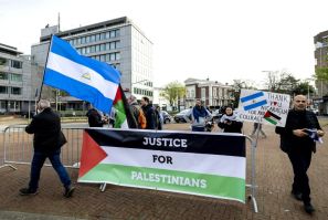 Protestors outside the International Court of Justice in The Hague on Monday