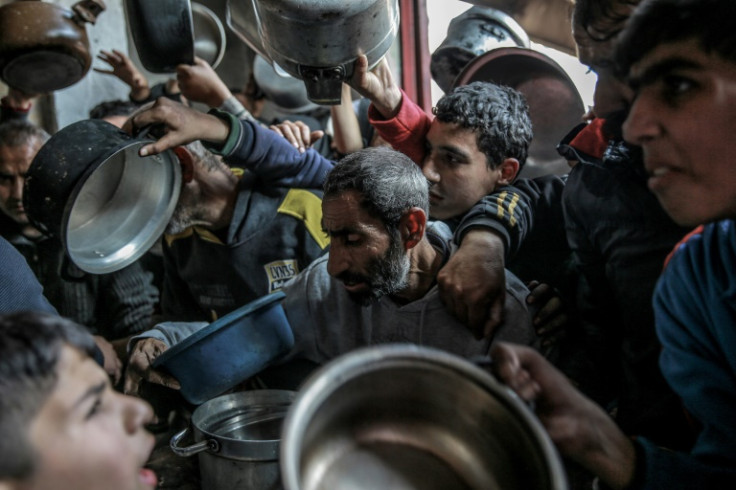 Palestinians jostled to obtain food aid in February in the northern Gaza Strip, where an estimated 70 percent of people face famine conditions