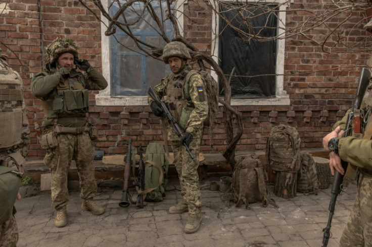 Ukrainian soldiers from the 23rd Mechanized Brigade prepare to head toward the frontline in the Donetsk region on April 3, 2024