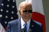 US President Joe Biden smiles during a joint press conference with  Japanese Prime Minister Fumio Kishida