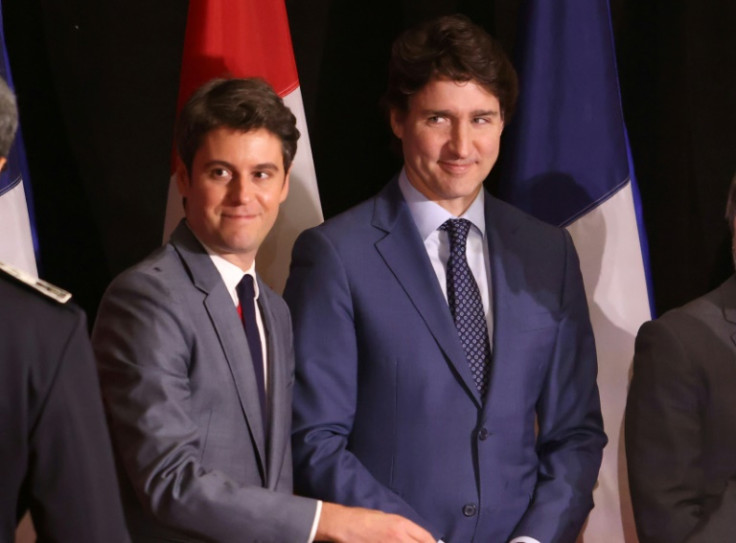 Canadian Prime Minister Justin Trudeau (R) and French Prime Minister Gabriel Attal backed the trade pact between Canada and the European Union