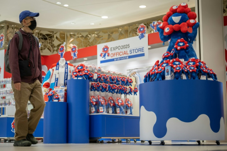 The red-and-blue Expo 2025 mascot "Myaku-Myaku" is billed by the official website as "a mysterious creature born from the unification of cells and water"