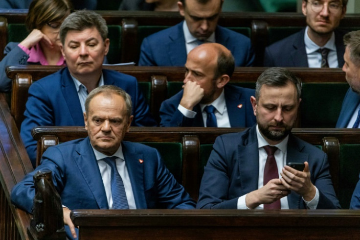 The hotly-anticipated vote was a test for the governing alliance of Polish Prime Minister Donald Tusk (L), as some coalition lawmakers were reluctant to back the legislation
