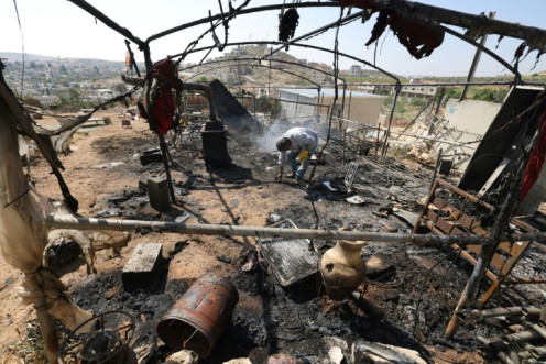 A burnt-out structure left in the aftermath of a raid by settlers looking for a missing Israeli teenager